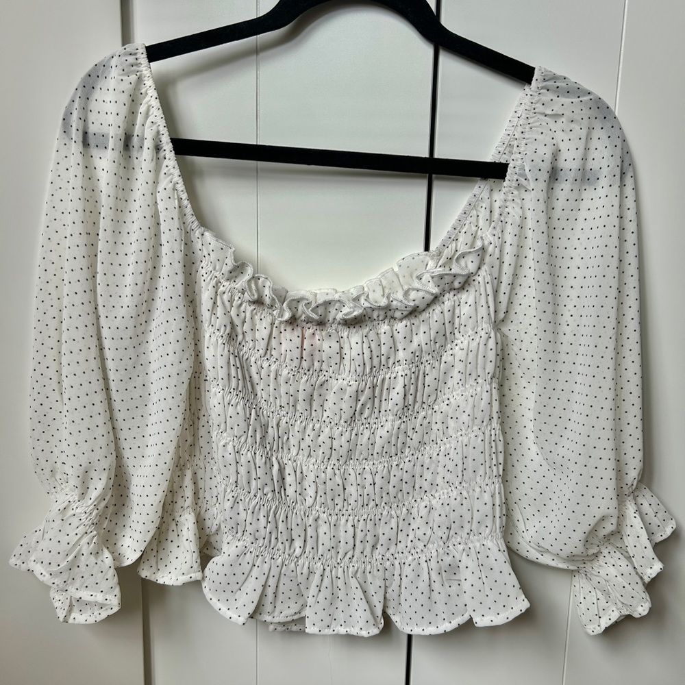 Elegant polka dot top with elastic ruching